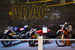 ADAC Messestand mit einer Aprilla RS 125, einer Honda (Mini Bike Cup) und einer KTM SX 85