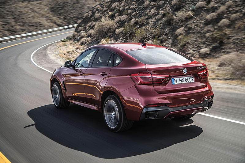 BMW X6 M50d in Flamenco Red in Flamenco Red