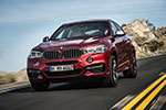 BMW X6 M50d in Flamenco Red