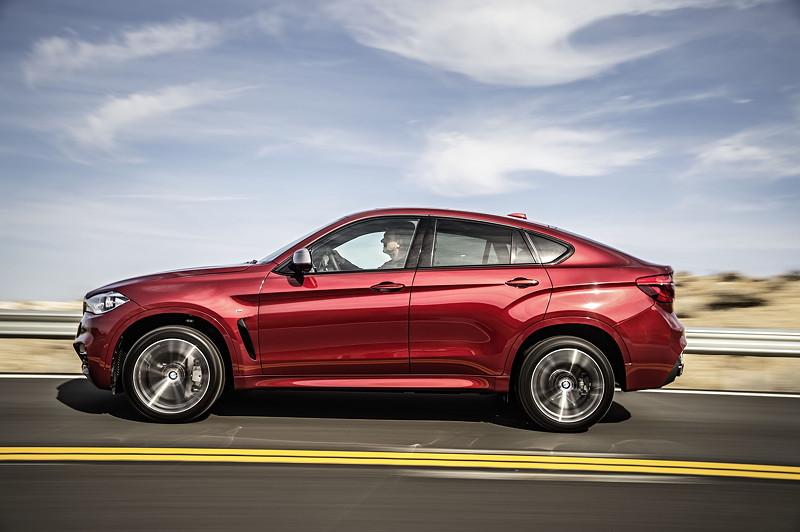 BMW X6 M50d in Flamenco Red