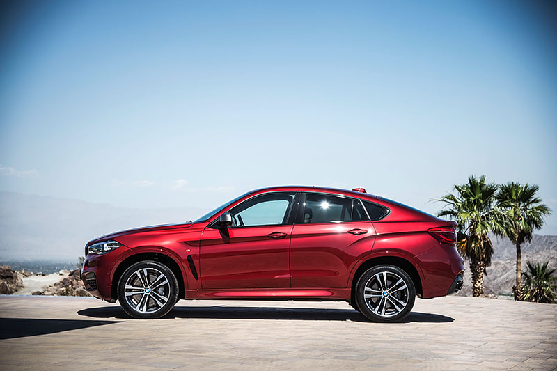 BMW X6 M50d in Flamenco Red