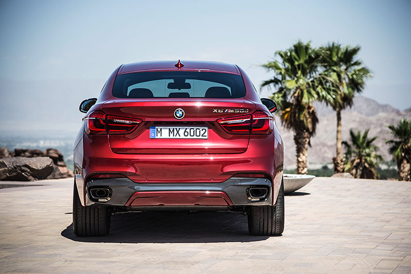 BMW X6 M50d in Flamenco Red