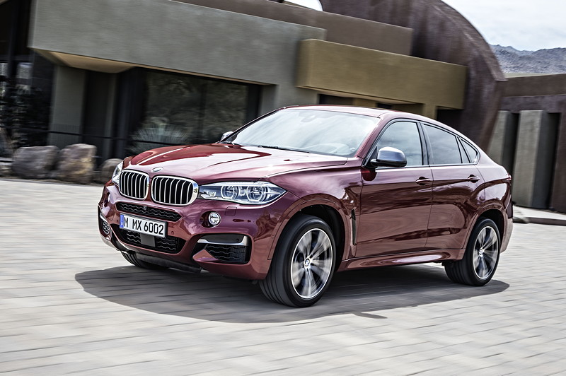 BMW X6 M50d in Flamenco Red