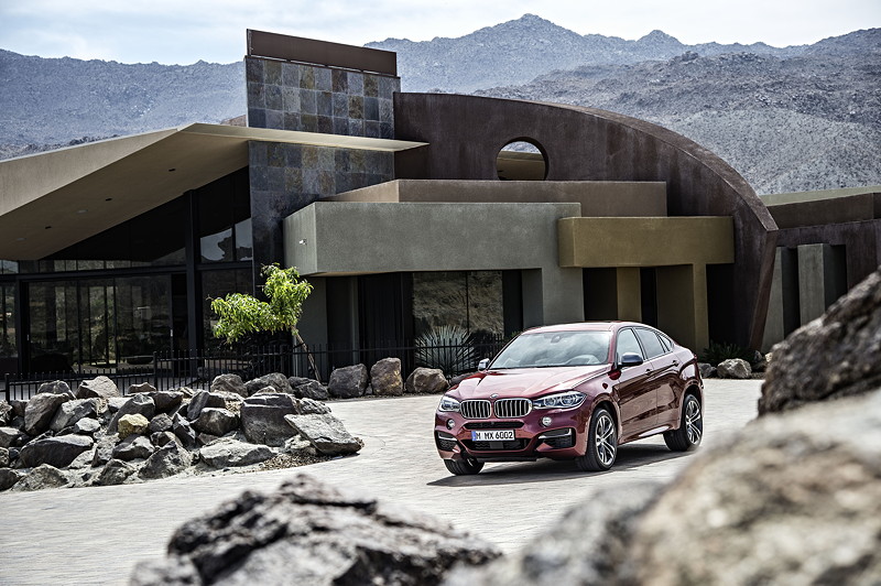 BMW X6 M50d in Flamenco Red