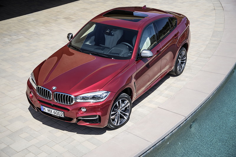 BMW X6 M50d in Flamenco Red