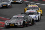 Oschersleben am 18.05.2014: Joey Hand (US) im Crowne Plaza Hotels BMW M4 DTM, Maxime Martin (BE) im SAMSUNG BMW M4 DTM únd Timo Glock (DE) im Deutsche Post BMW M4 DTM.