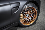 BMW M4 GTS auf M Leichtmetallrädern 9,5 J x 19 vorn und 10,5 J x 20 hinten. Exklusives Design Sternspeiche 666 M in Acid Orange, geschmiedet und glanzgedreht.
