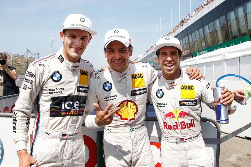Zandvoort (NL) 11. Juli 2015. BMW Motorsport, 2. Platz Fahrer Marco Wittmann (DE), Augusto Farfus (BR), Pole Position und 3. Platz Fahrer Antonio Felix da Costa (PT).