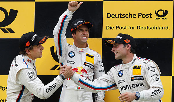 Zandvoort (NL) 12. Juli 2015. BMW Motorsport, Rennen 8, Zweitplatzierter Augusto Farfus (BR), Gewinner Antonio Felix da Costa (PT) und Drittplatzierter Bruno Spengler (CA). width=
