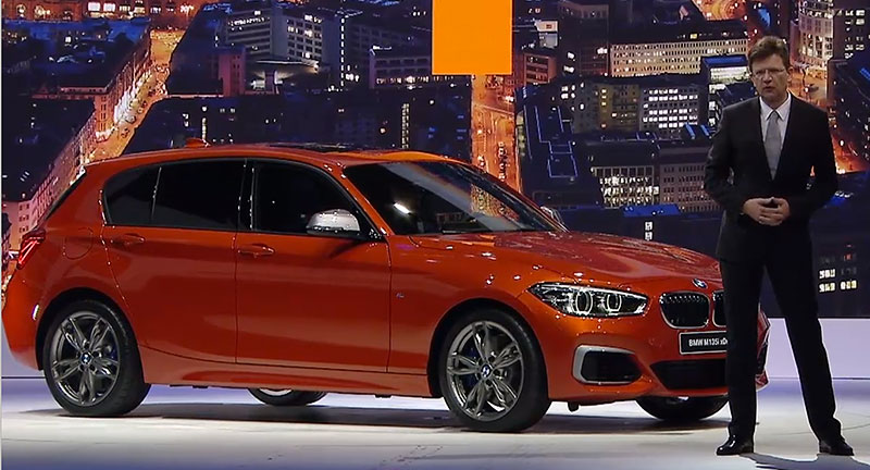 Klaus Frhlich, neues BMW Vorstandsmitglied, in Genf mit dem facegelifteten BMW 1er