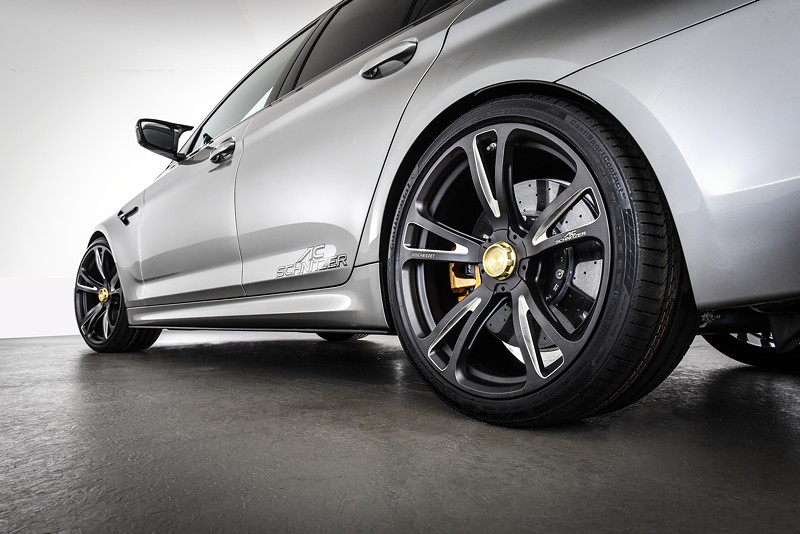 BMW M5 by AC Schnitzer auf AC3 Evo Felgen in Bicolor anthrazit/silber mit Zentralverschluss in gold