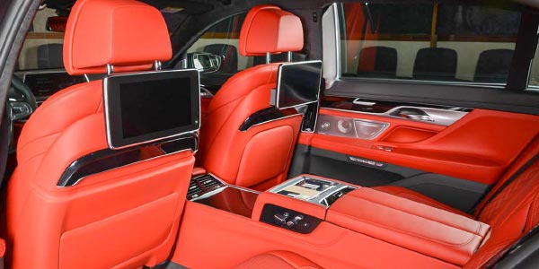 BMW 730Li mit BMW Individual Merino Voll-Leder Ausstattung in Fiona rot und Executive Lounge inkl. Fond Entertainment Experience