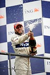 Nick Heidfeld beim Champagner-Verspritzen in Spa/Belgien