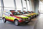 Fünf der acht Fahrzeuge der neuen BMW X3 Notarzteinsatzflotte bei der Übergabe in der BMW Welt