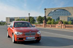 BMW 120d Urban Line (F20) on location in Berlin, im Hintergrund das Kanzleramt.