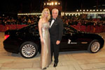 Berlinale 2011: Hans-Reiner Schr&ouml;der / Direktor BMW Niederlassung Berlin und Frau Katerina vor BMW Active Hybrid 7 (F04).