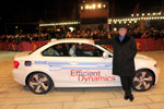 Berlinale 2011: Berlinale-Direktor Dieter Kosslick vor BMW Concept ActiveE.