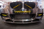 Essen Motor Show 2013: Manhart MH1 400 auf Basis BMW M 135i, optisch mit markanten gelben Akzenten