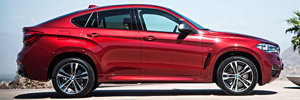 BMW X6 M50d in Flamenco Red
