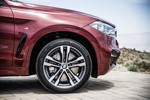 BMW X6 M50d in Flamenco Red