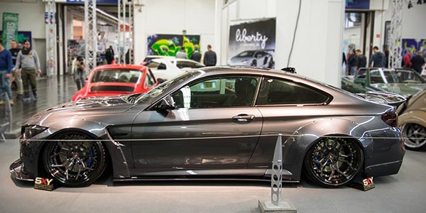 BMW M4 (F82) mit 'Liberty-Walk' Widebody Kit, ausgestellt in der tuningXperience, Essen Motor Show 2017.