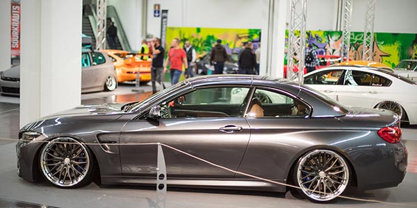 BMW M4 Cabrio (F83) mit Competition Paket in mineralgrau, ausgestellt in der tuningXperience, Essen Motor Show 2017.