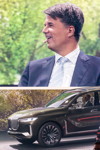Harald Krüger, Vorsitzender des Vorstands der BMW AG, auf einem Bildschirm. Davor das BMW Concept X7.
