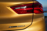 BMW X2 xDrive20d, Modell M Sport X, in Galvanic Gold, on location in Lissabon.