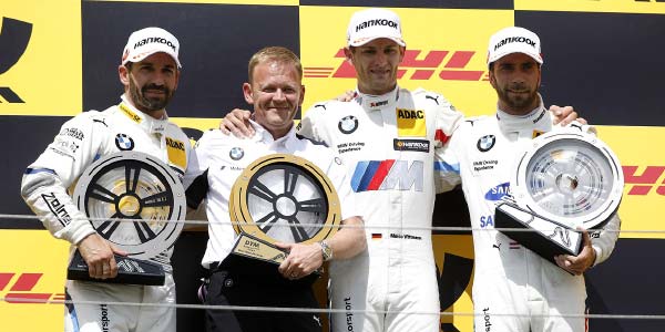 Podium in Budapest: Gewinner Marco Wittmann, Zweitplatzierter Timo Glock und Drittplatzierter Philipp Eng (AUT) mit Stefan Reinhold Team Chef BMW Team RMG