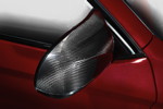 Der neue BMW X4 M Competition. Optionales M Carbon Exterieurpaket mit Außenspiegelklappen in Carbon.