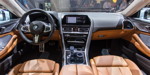 BMW M850i Gran Coupé, Interieur vorne mit BMW Individual Volllederausstattung Merino Cognac.