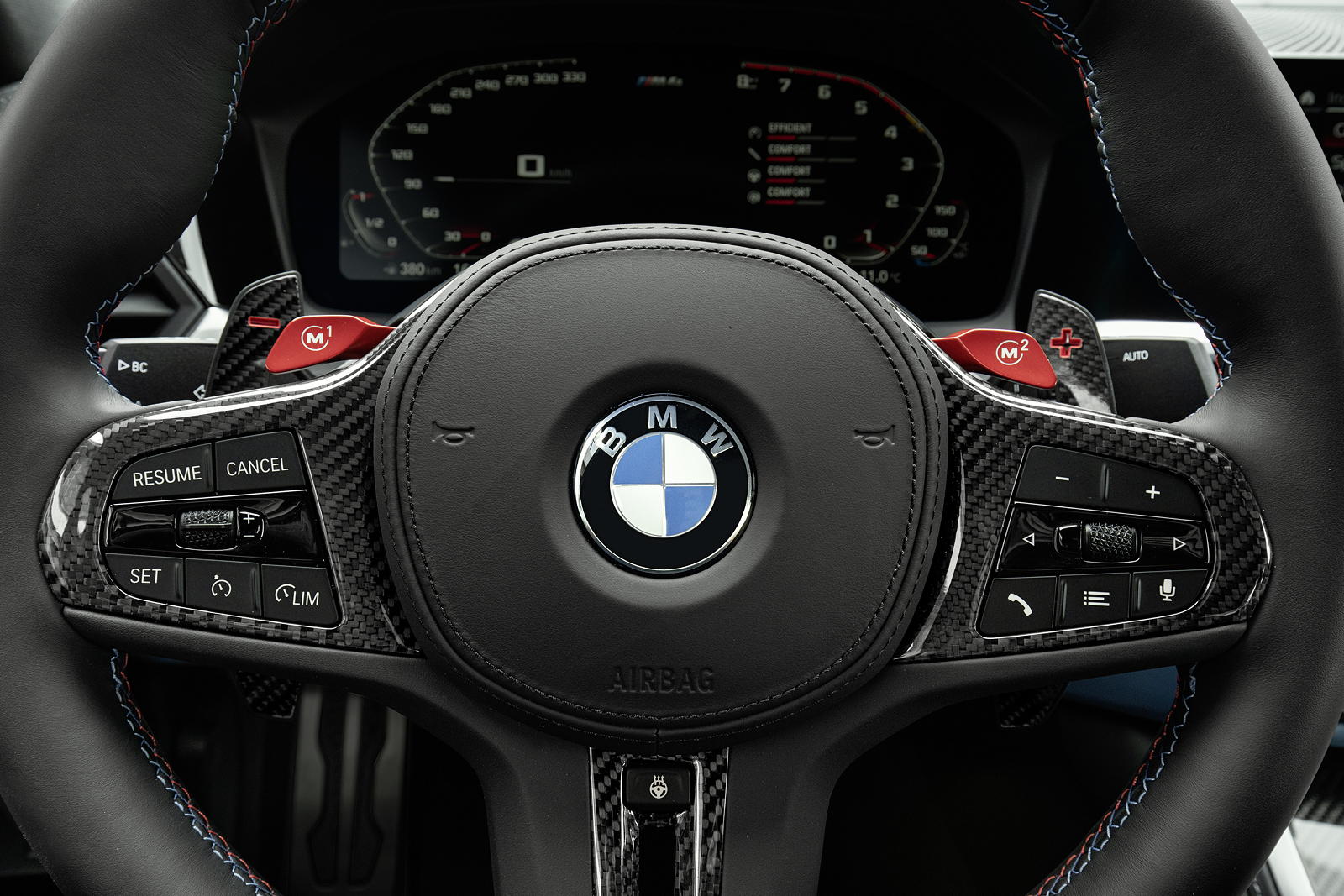 Foto: BMW M4 Competition Coupé, M-Tasten am Lenkrad. (vergrößert)