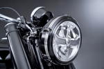 BMW R 18 First Edition. Individualisierung. Scheinwerfer Gehäuse im 'Roland Sands Design'.