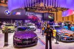 Essen Motor Show 2022: BMW M4 Competition in BMW Individual Purple Silk metallic mit BMW M Performance Parts