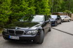 Rhein-Ruhr-Stammtisch im Mai 2026: drei Generationen 7er-BMW (E65, G70, E23) auf dem Stammtischparkplatz